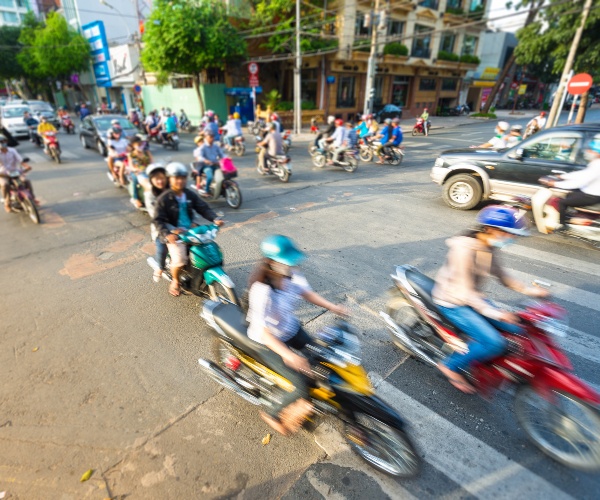 Scooters moving through Hanoi
