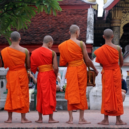 Monks waiting for alms Luang Prabang